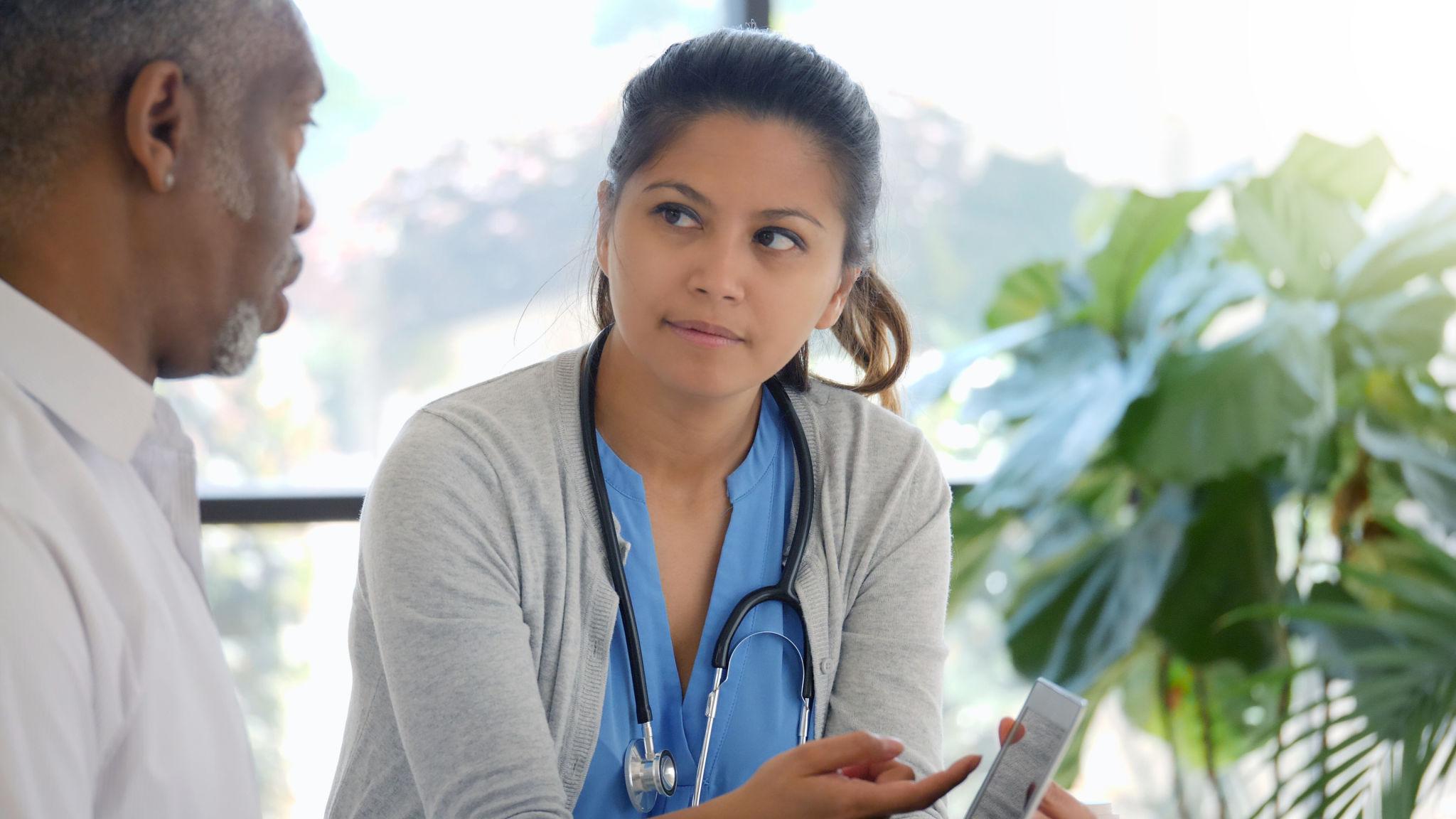 Patient undergoing breath testing for SIBO diagnosis measuring hydrogen and methane gas levels