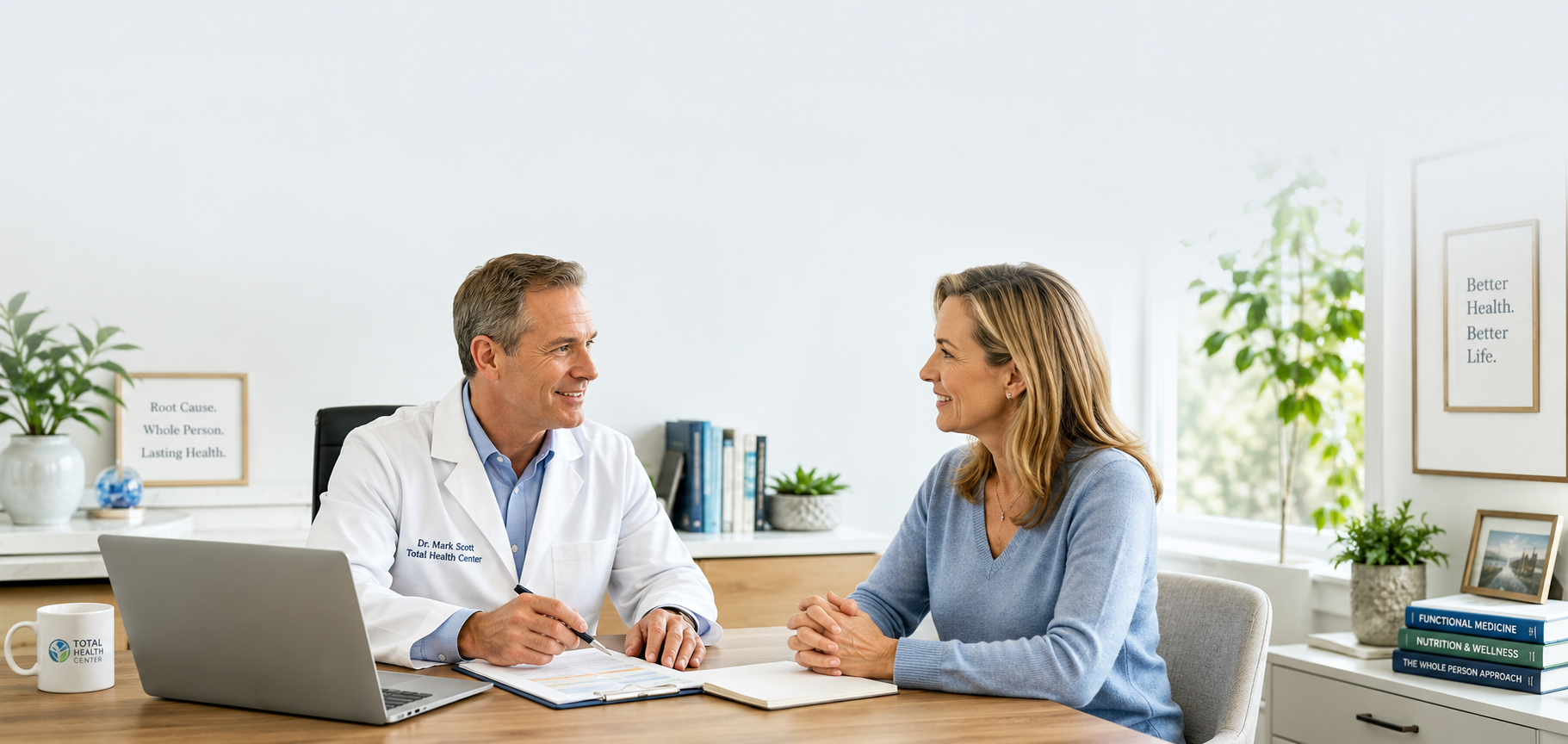 "Dr. Mark Scott discussing hormone health with a patient during a functional medicine consultation at Total Health Center in Virginia Beach."